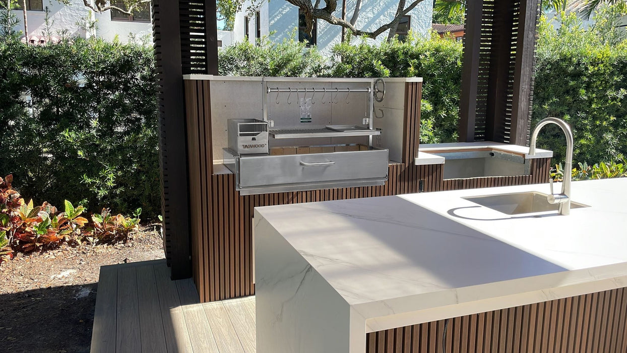 Tagwood BBQ05SS in a stainless outdoor kitchen beside the sink