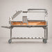 Tagwood BBQ06SS with the clamp grill and firebrick-lined firebox visible