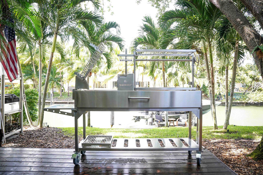 Tagwood BBQ06SS on a waterfront deck under palm trees