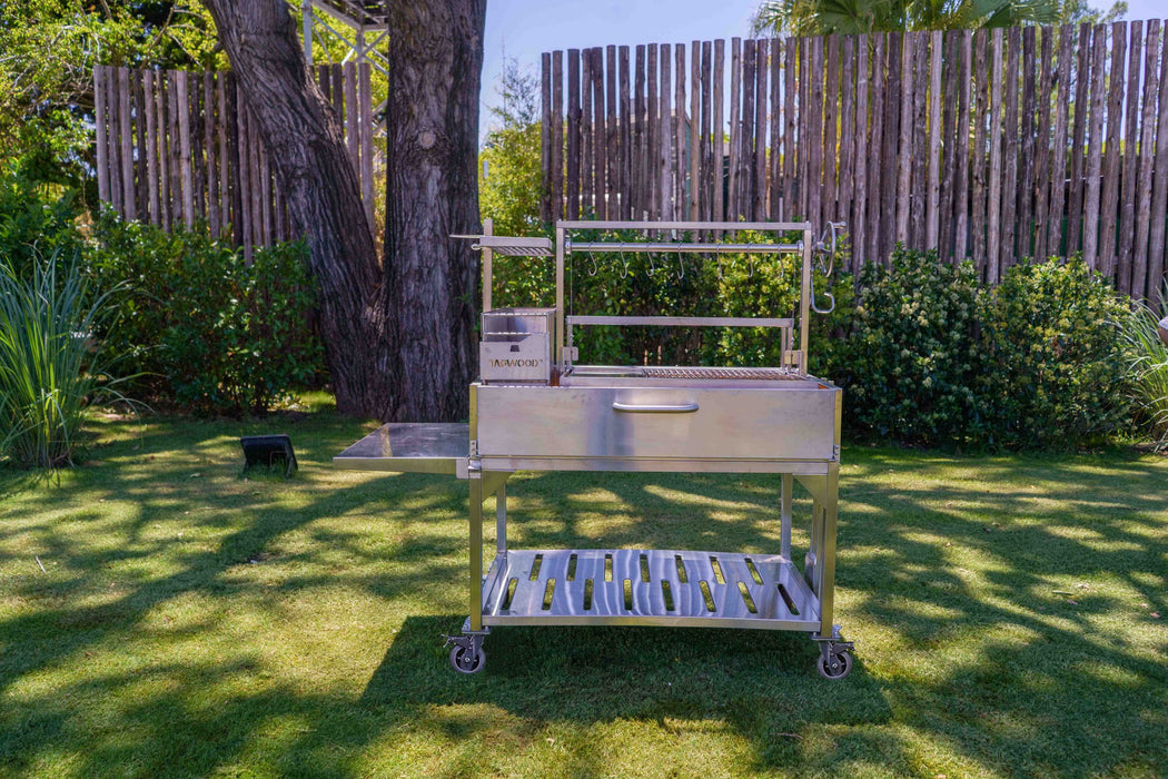 Tagwood BBQ23SS on a lawn by a wood fence