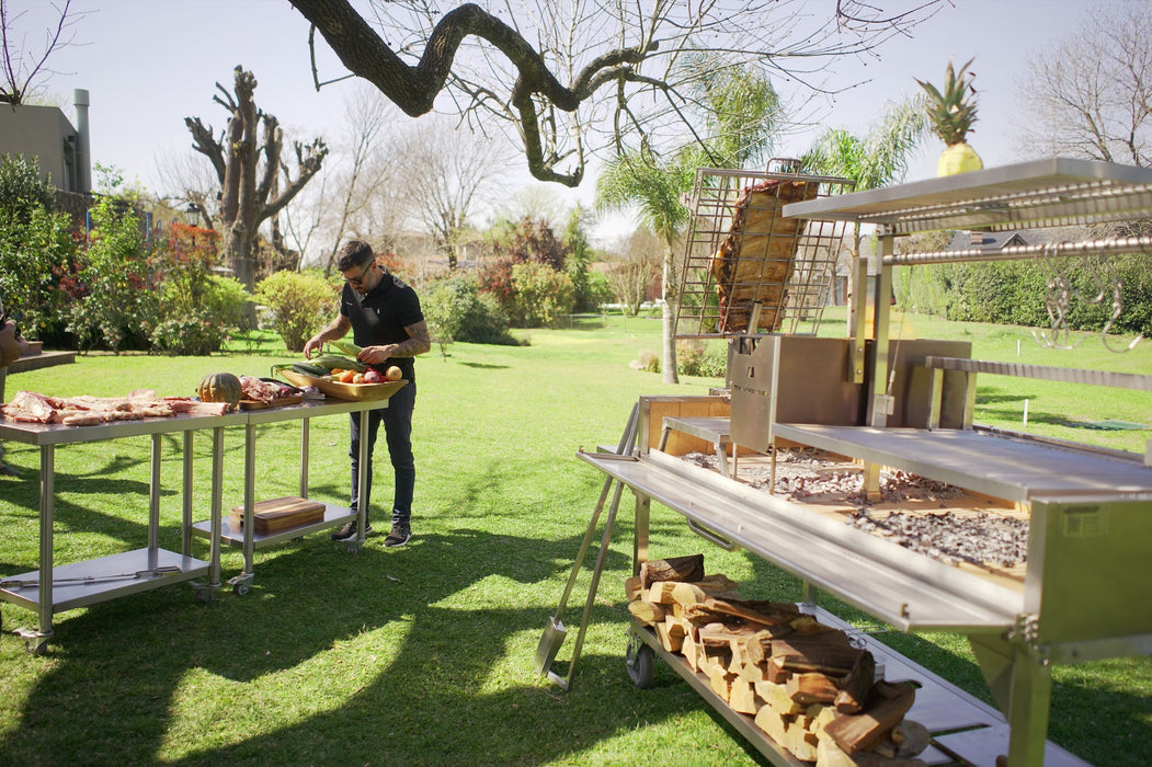 Cooking on a Tagwood BBQ26SS in a garden