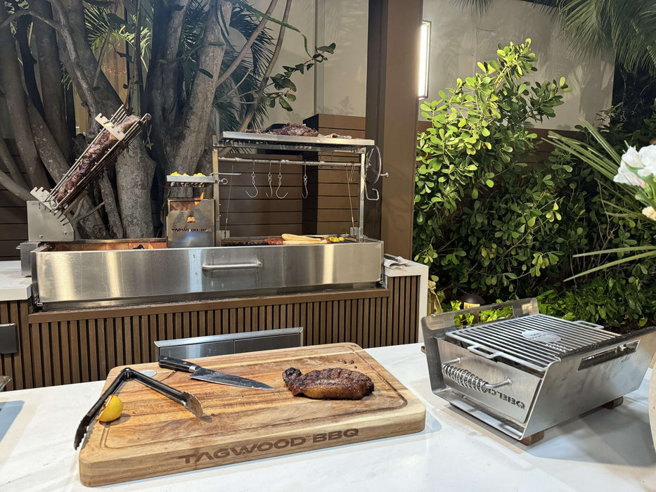 Tagwood warming brazier on the table beside a carving board