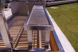 Tagwood warming rack over the main grate