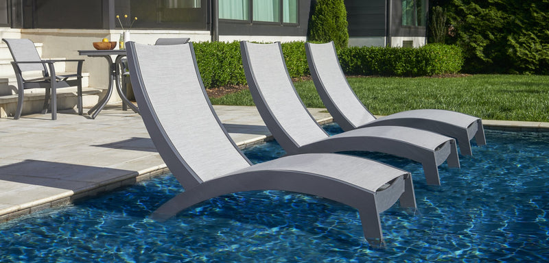 Telescope Casual Dune in-pool lounge chaises on a sun shelf
