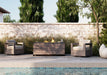 Woodard Beau swivel lounge chairs by a fire table (pieces shown sold separately)