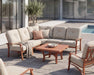 Woodard Cortland cushion seating on a covered patio