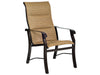 Woodard Cortland Padded Sling High-Back Dining Arm Chair in an outdoor setting