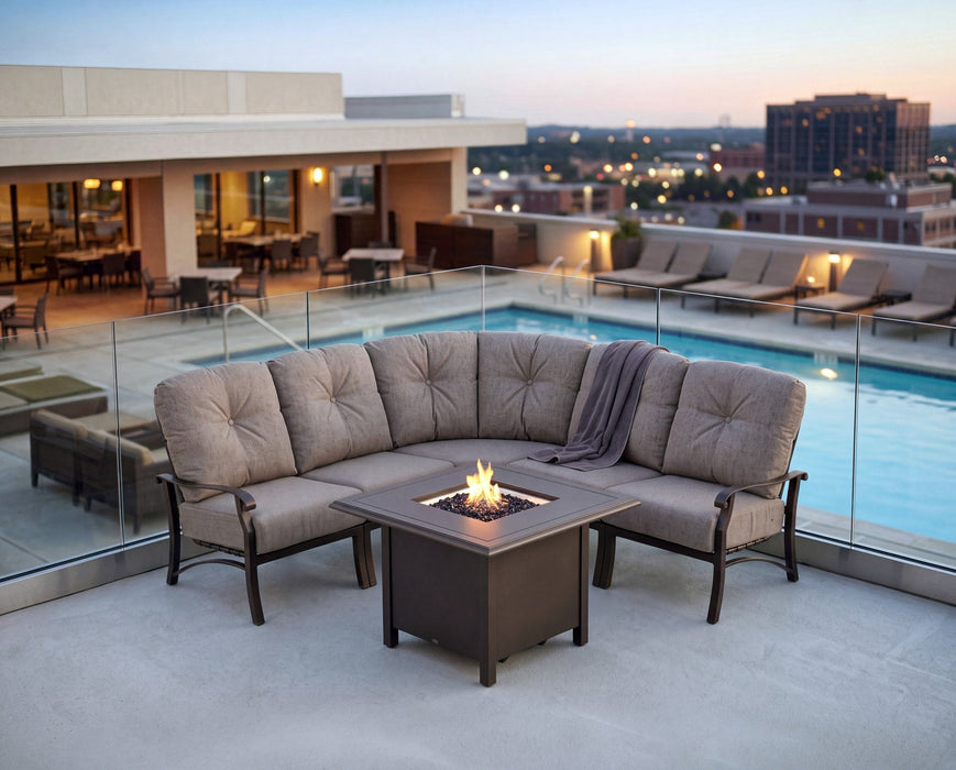 Woodard Cortland 5-piece curved sectional around a fire table on a rooftop (fire table sold separately)