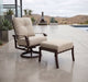 Woodard Cortland swivel rocking lounge chair with the matching Cortland ottoman on a desert terrace by the pool
