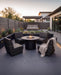 Woodard Genie curved lounge chairs around a fire table (pieces shown sold separately)