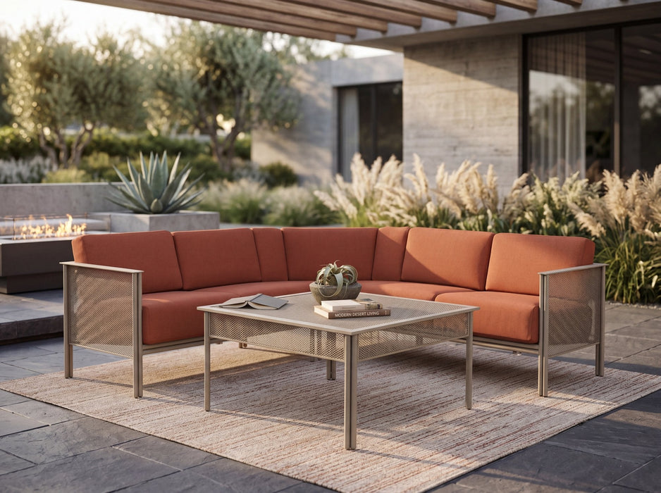 Woodard Jax 3-piece L-shape sectional with rust cushions on a patio (coffee table and decor sold separately)
