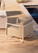 Close-up of the Woodard Juno woven seat and Oyster frame