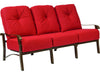 Woodard Cortland Sofa, shown with red cushions