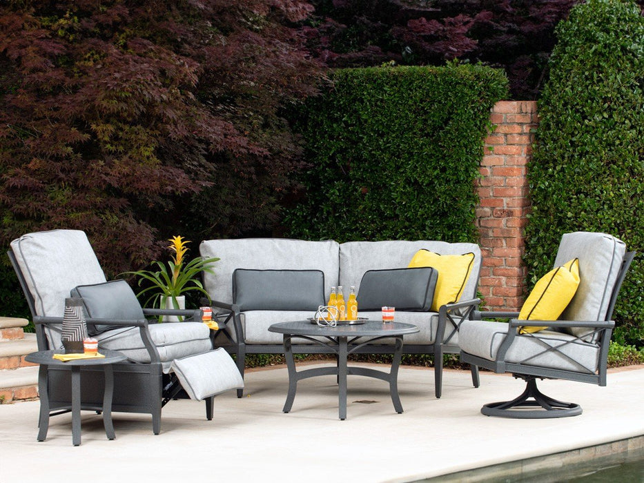 Woodard Andover Swivel Rocking Lounge Chair, with Andover seating by a pool