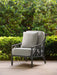 Woodard square throw pillow on a Woodard lounge chair