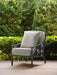 Woodard square throw pillow on a Woodard lounge chair
