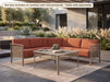 Woodard Jax L-shaped sectional on a patio; this set also includes an armless unit (coffee table sold separately)