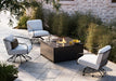 Woodard Reed swivel lounge chairs around the Essence solid panel fire table