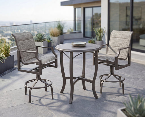 Woodard Nico sling swivel bar stools at the 32" round Solid Cast Carson bar table
