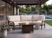 Woodard Andover crescent sofa around the Thatch rectangular chat height fire table