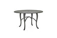 Woodard Hampton Top Cabriole Base round dining table in a lighter finish