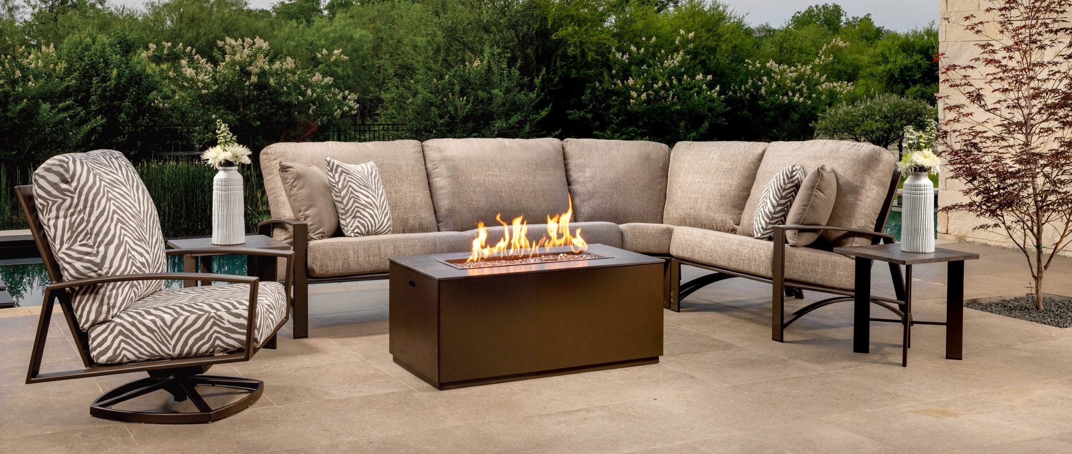 Arc sectional and swivel rocker by the pool