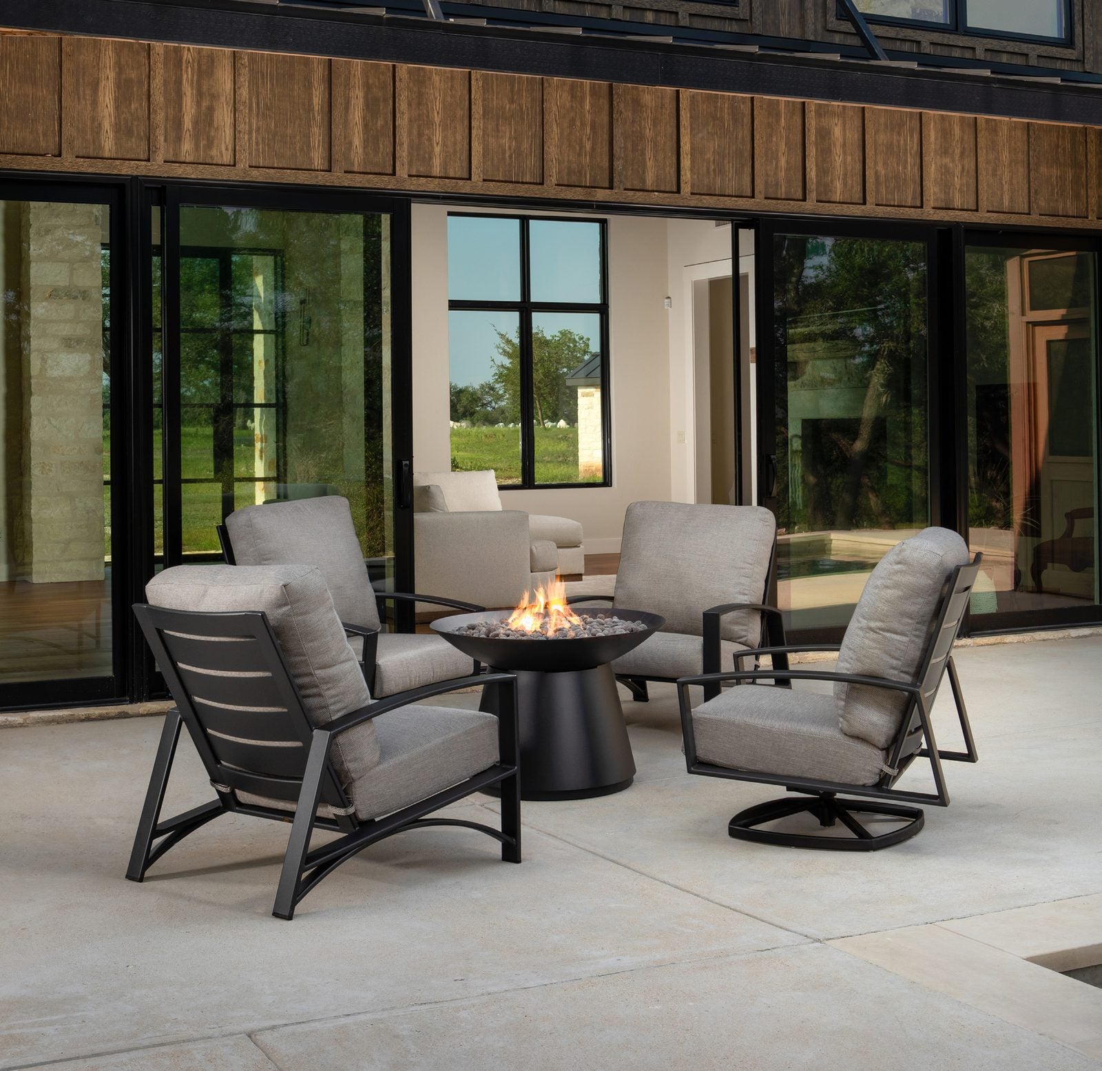 Arc lounge chairs around the fire