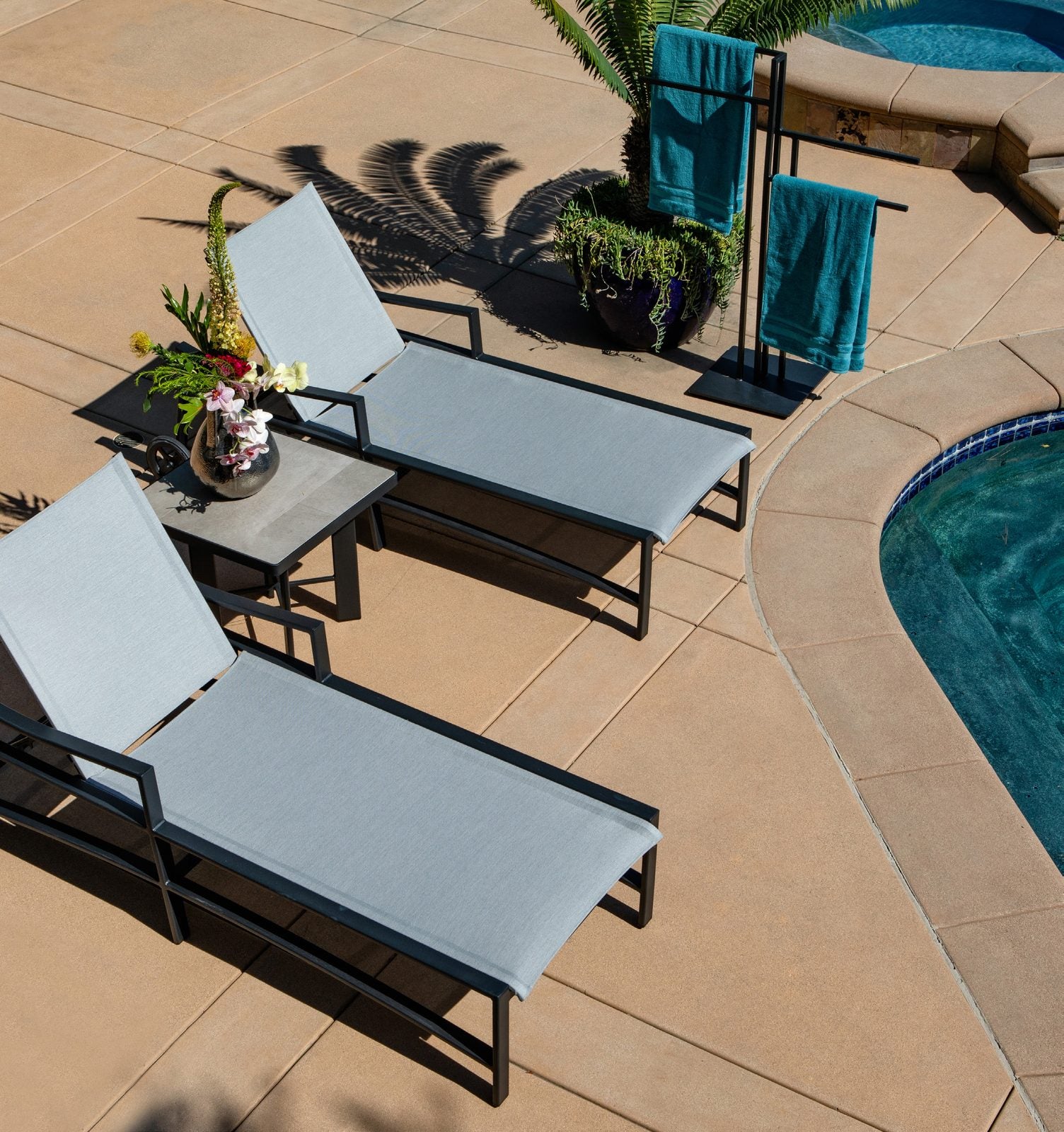 Avana sling chaises by the pool
